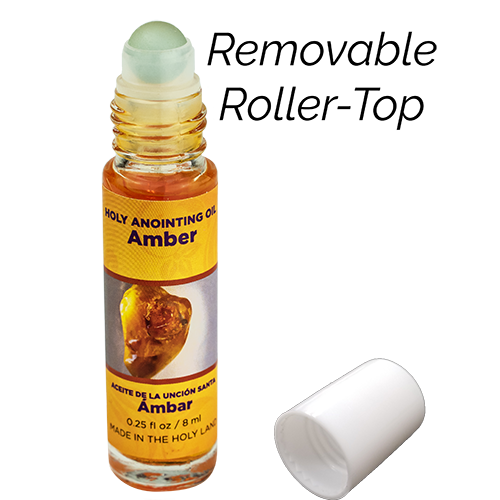 lid-off picture of amber holy oil demonstrating the removable roller top