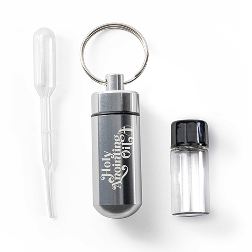 Oil Vial Keyring showing keyring vial holder, vial and eyedropper