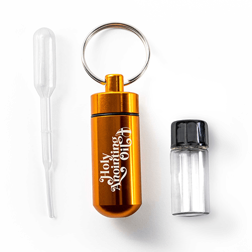 Oil Vial Keyring showing keyring vial holder, vial and eyedropper