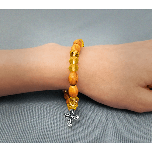 Olive Wood Stretch Bracelet, Yellow Beads and Cross Dangle