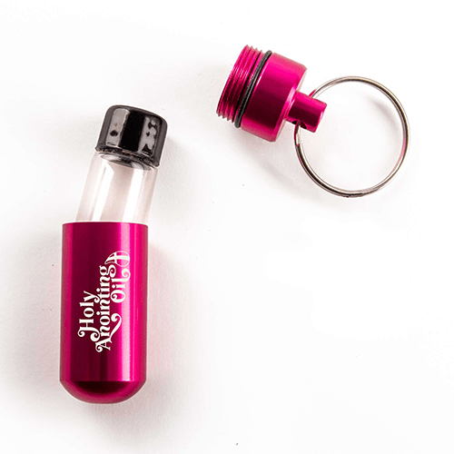 Oil Vial Keyring showing open keyring vial holder with vial inside