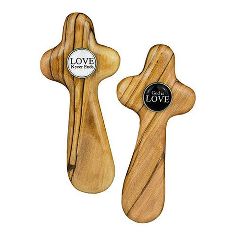 Deluxe Medium Bride and Groom Comfort Crosses showing White Love Never Ends and Black God is Love raised button on center of crosses.