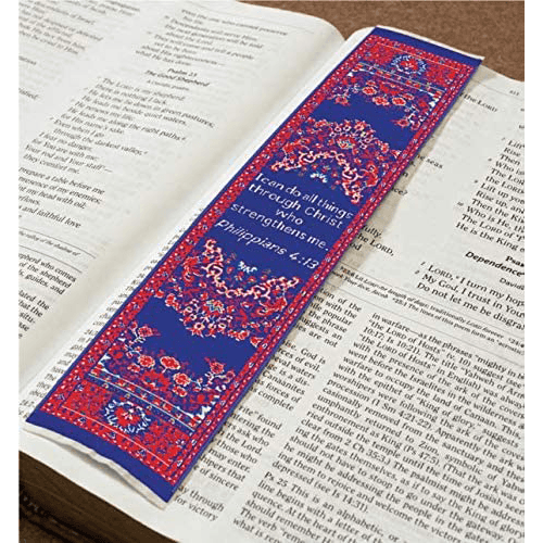 woven tapestry-style bookmark placed on a bible