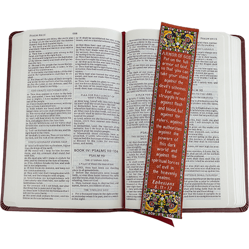 woven tapestry-style bookmark placed on a bible
