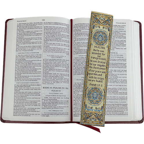 woven tapestry-style bookmark placed on a bible