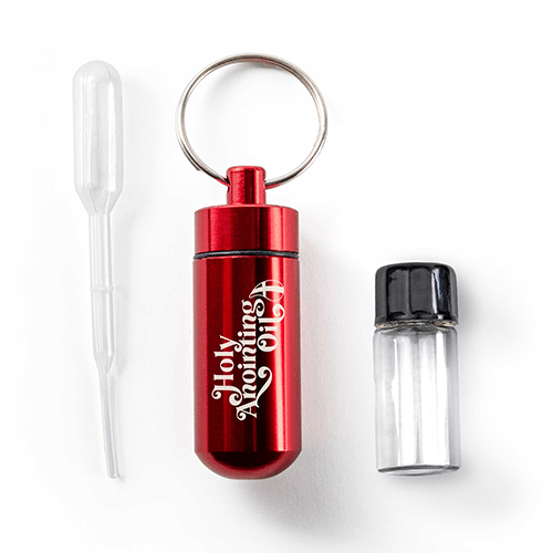 Oil Vial Keyring showing keyring vial holder, vial and eyedropper