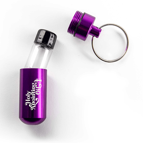 Oil Vial Keyring showing open keyring vial holder with vial inside