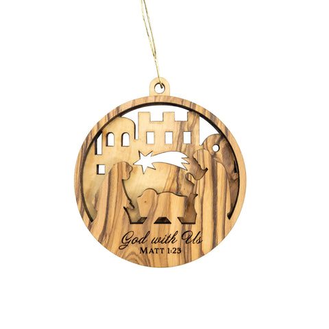 Olive Wood Christmas ornament with cut-out nativity design and 'God with Us Matt 1:23' text on a white background