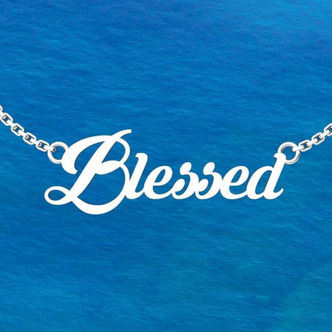 Blessed Sterling Silver pendent in an 18 inch chain with ocean background