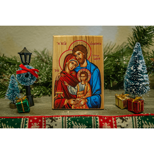 Holy Family Olive Wood Color Icon on a mantle