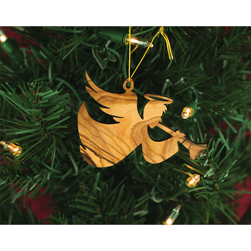 holy land trumpeting angel holiday ornament hanging on a christmas tree