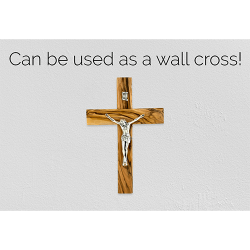 crucifix cross and inri plaque hanging on a wall using the hanging hall